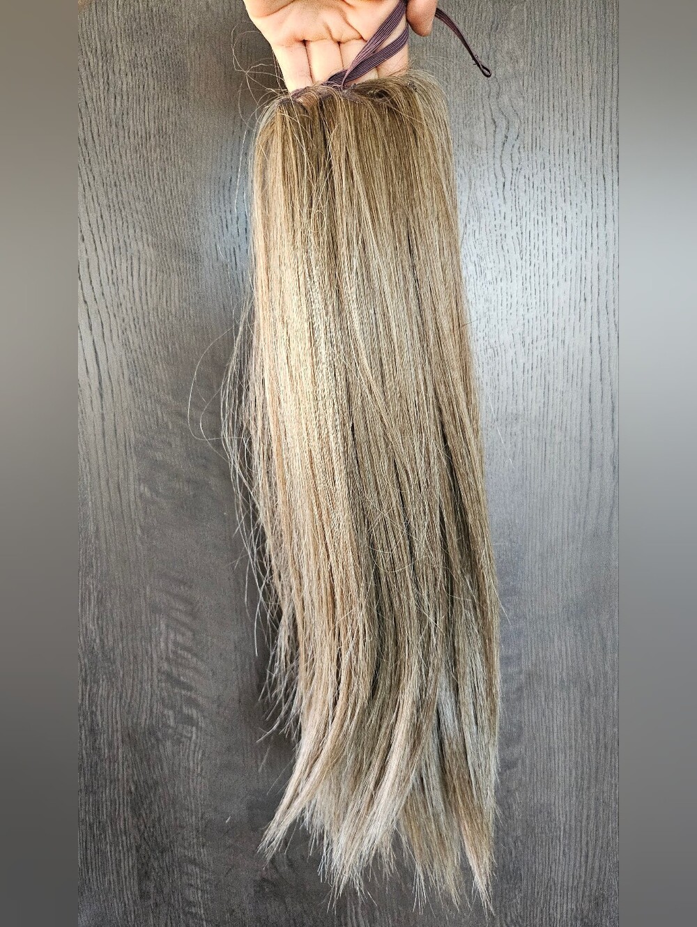 Hair piece, i believe the color may be ash blonde or a light brown. - Picture 3 of 6